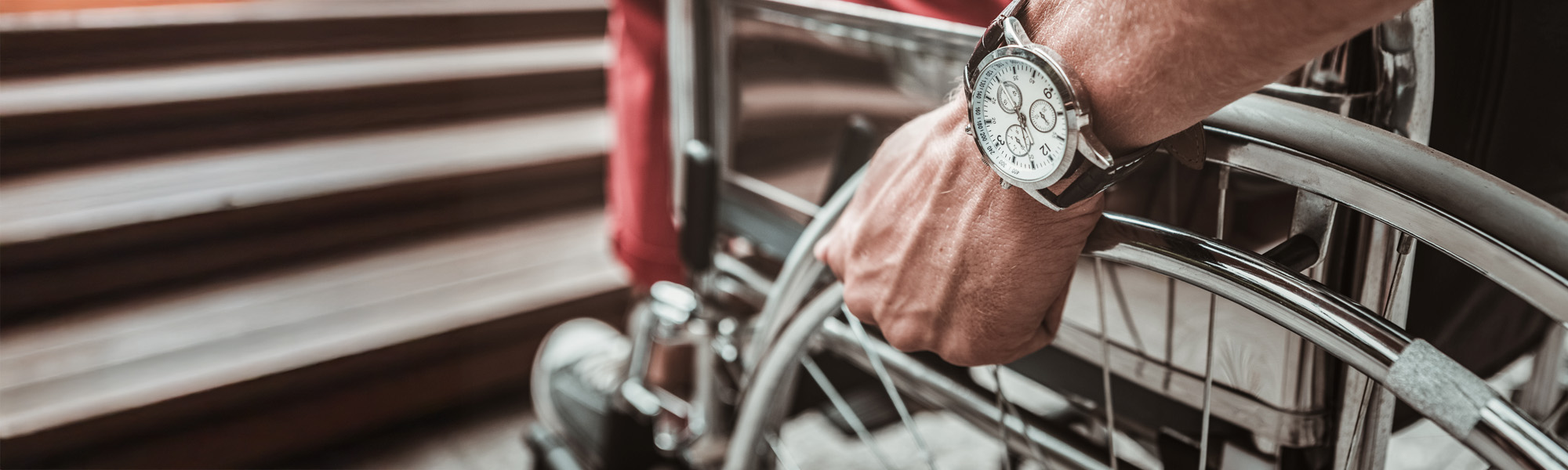 Close up of big watch on the wrist of the disabled man