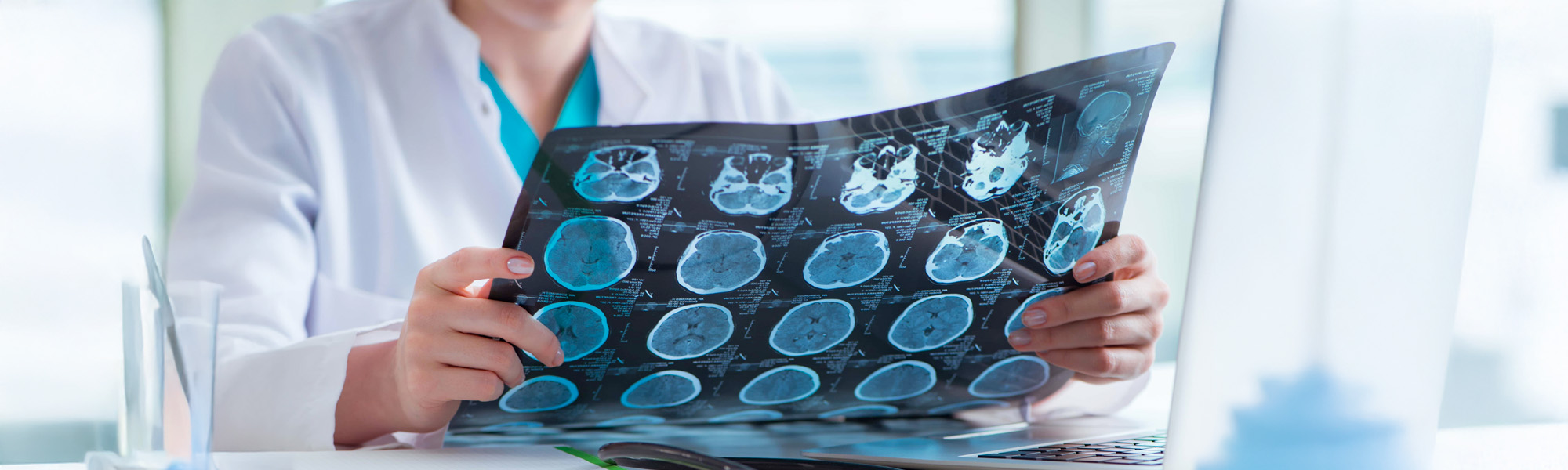 Doctor examining MRI image in hospital