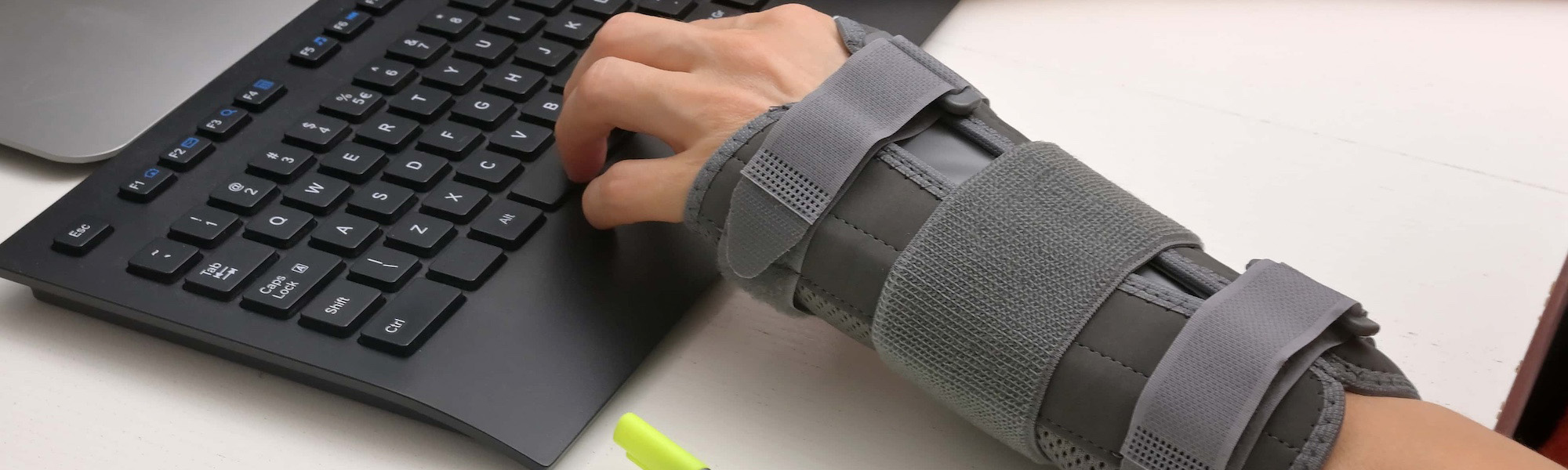 contused woman hand in stabilizer working