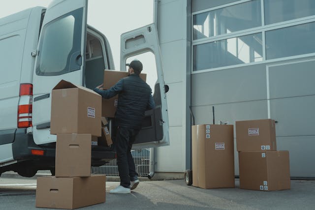 delivery driver loading vehicle
