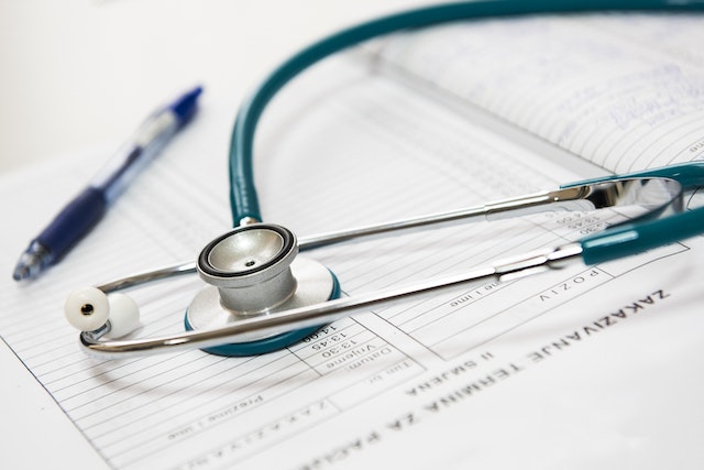 medical records, pen, paper