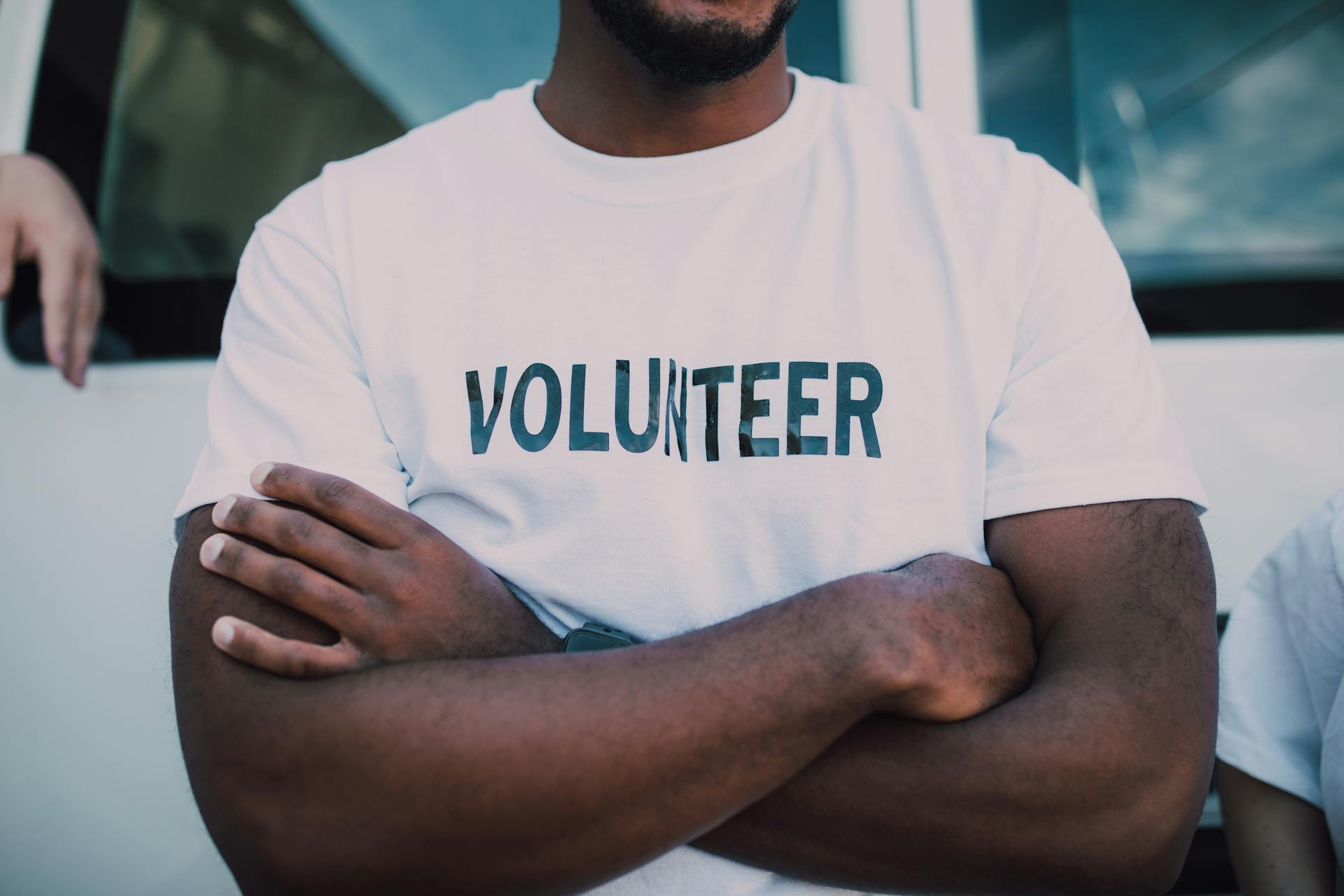 man in volunteer shirt